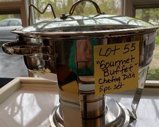 Lot 55. $18.00.  Gourmet Buffet Branded stainless steel chafing dish.  5 pc set includes: Lid, food bowl and steamer, stand and sterno holder.  Perfect for all those zoom parties you are currently having in quarantine.