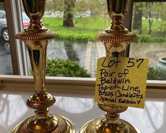Lot 57 - $50.  Pair of “Top of the Line” and heavy “Special Edition” Baldwin candlestick holders part of the “Smithsonian Institution” Our client used to be a headhunter and placed the President of Baldwin in his job - these were given to her as a thank you, and trust me when we say these are like no other Baldwin candleholders you’ll ever see!