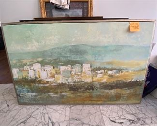 Lot 76   $75. Canvas wrapped cityscape in mountains Pier 1 price of $199