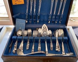 Lot 77.  $75. Community Silver Plate Coronation Flatware Service for 8 - 63 pieces Plus Case and bonus serving pieces.  Nice wedding gift.  