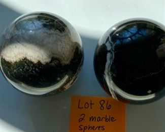 Lot 86   $ 32.00  Two marble orbs or spheres with interesting black,  white and gray veins - Size fits in the palm of your hand - see further photos.  From Pakistan. 