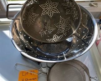 Lot 87.   $24.   Lot of 4 Sieves or Strainers.  Includes stainless large colander, an aluminum medium size (with the star-shaped holes), and two handheld strainers - both good sizes for straining soups, berries, etc.  Is it time to upgrade yours?  