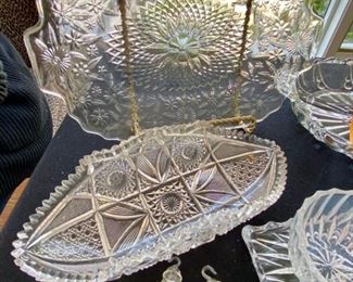 Lot 91.  Clear glass lot.  Small platter 11.45", small boat (10 inches) , divided platter, cream, sugar, underplate.  