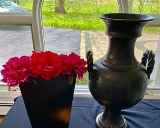 Lot 96.   $65  Black Pottery:  Haeger S. Maglio Black urn Pottery (20 inches high, 10 inches wide, signed.  Metal Black Vase with red florals, (12 inches by 9 inches)