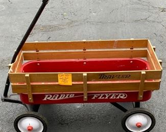Lot 113. $40.  Radio Flyer Wagon. (new runs $119 at Target)  Needs to be cleaned out but in very good condition. This classic wagon has traveler sides to keep your young ones from falling out.  These wagons aren't just for kiddies - they help in gardening, moving out the trash and other mundane reasons - but it is a workhorse!
