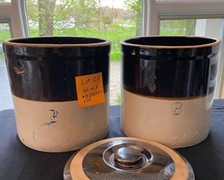 Lot 120. $50. Antique set of two  3-Gallon Crocks and one lid.  Crocks have early blue markings, but no stoneware manufacturer listed.  Some cracking. 