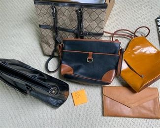 Lot 154.  $50. Lot of purses.  Fun for every occasion! REal cute buys.  The leather clutch is butter soft, the center black and brown is so classic! The golden shoulder bag is beautiful and from Italy. 