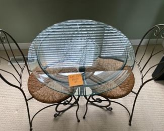Lot 155.  $185 (what a steal!).  This beautiful bistro set (2 chairs and glass table).  The table has a glass top and wrought iron base, with the most adorable sun in the center (under glass). The chairs look like they would be at home in an ice cream shoppe, they have a nice woven seat! 
