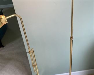 156 B. $60. Brass Reading Lamp.  This telescoping reading lamp has a beautiful patina and would look at home with any type of decor!  