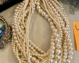 Lot 188. Pearl multi-strand necklace, part of the 
