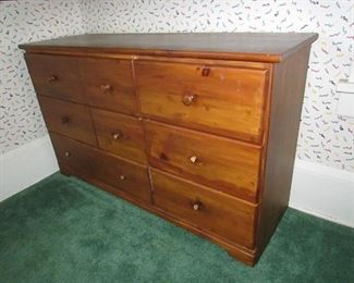 Dresser with pine finish (compressed wood construction). 48"w X 28"h X 15.25"d. Lacking some knobs. Great to re-purpose! PRICE: $40.00