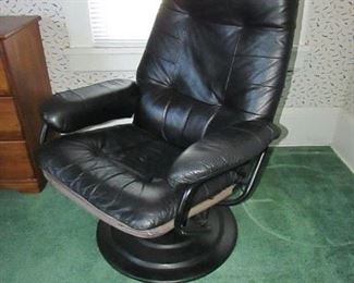 "Chairworks" tilt-back recliner. leather-looking cushion over canvas and metal.  (some wear). 28"w  40"h X 22"d. PRICE: $40.00
