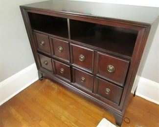 Contemporary 4-drawer chest/media stand. holes for cables in back. (some wear). 44"w X 36"h X 18"d. PRICE: $100.00