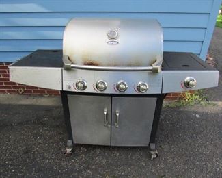 Uniflame large stainless steel grill. This grill is well used and in need of cleaning. As-is but working. PRICE: $75.00 as-is.