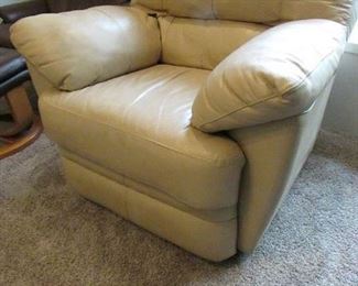 Faux Leather recliner. (Manhattan Sandstone color). 40"w X 36"d X 38"h. PRICE: $150.00 