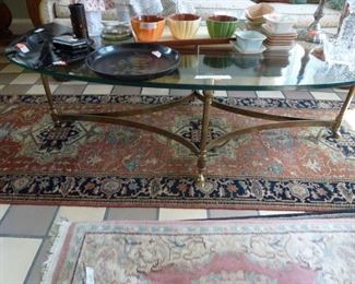 Contemporary glass top and brass table