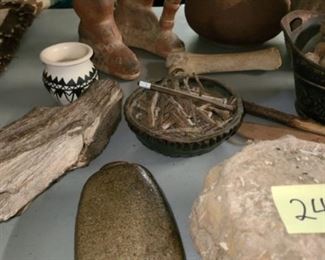 #24 $55 - Fossils, Native American Pottery, and Antique Nails. ONLY items on the table are included except for the partial picture of the rug on the table, that is not included  