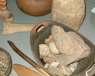 #24 $55 - Fossils, Native American Pottery, and Antique Nails. ONLY items on the table are included except for the partial picture of the rug on the table, that is not included  