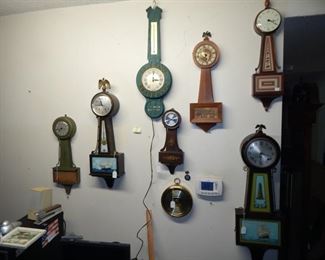 
#2 $125 - Lot of Clocks (8) Green Gilbert, Naval Seth Thomas, Seagrams Benchmark Thermometer, Floral Quartz, Barigo Barometer, Brown Banjo, Seth Thomas, and Sessions Lighthouse. All eight one price