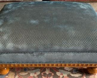 35. Upholstered Ottoman on Hardwood Base (38'' x 27'' x 17''), $ 350.00