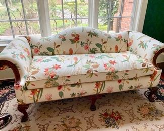 52. Camelback 1 Cushion Floral Upholstered Sofa w/ Carved Wood Detail (78'' s 35'' x 36''), $ 1,050.00