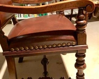 139. Pair of Leather Arm Chairs w/ Carved Wood Base w/ Nailhead Detail (23'' x 24'' x 44''),  $ 550.00 