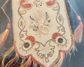 25. Antique Embroidered Hand Bag, $ 250.00