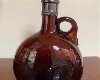 179. Amber Glass Bottle w/ Silver Top, $150.00