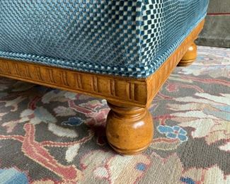 35. Upholstered Ottoman on Hardwood Base (38'' x 27'' x 17''), $ 350.00