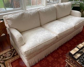 58. Upholstered Cream 3 Cushion Sofa w/ Bouillon Fringe (83'' x 37'' x 34''), $ 1800.00