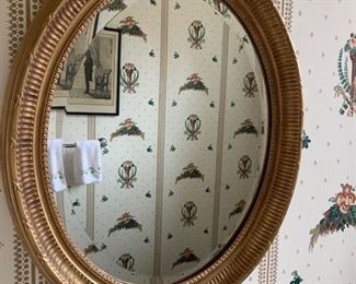 66. Oval Bevelled Gilt Carved Mirror (19'' x 23''), $ 180.00