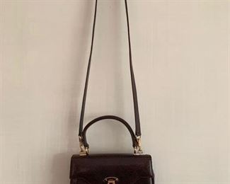 Gucci Brown Skin Handbag w/ Brass Detail (very good condition) (8'' x 7'') $400