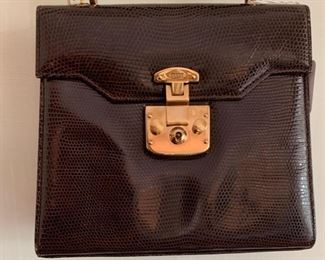 Gucci Brown Skin Handbag w/ Brass Detail (very good condition) (8'' x 7'') $400