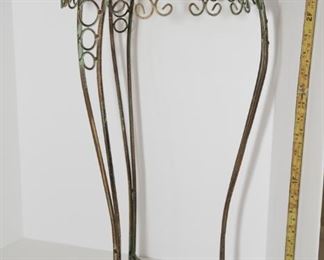 F9	28” Aged Metal Plant Stand	$18.95