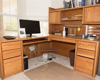 F18	Oak Corner Office Desk  Left Side 80”w x 21”d x 29”t     Right Side 68”w x30”d x 65” tall	$99.95