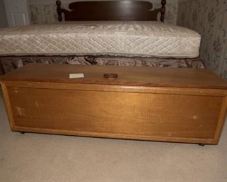 F21	Handcrafted Rolling Oak Chest  48”L x 12.5” D x 15” H	$44.95