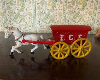cast iron horse and wagon. 25.00