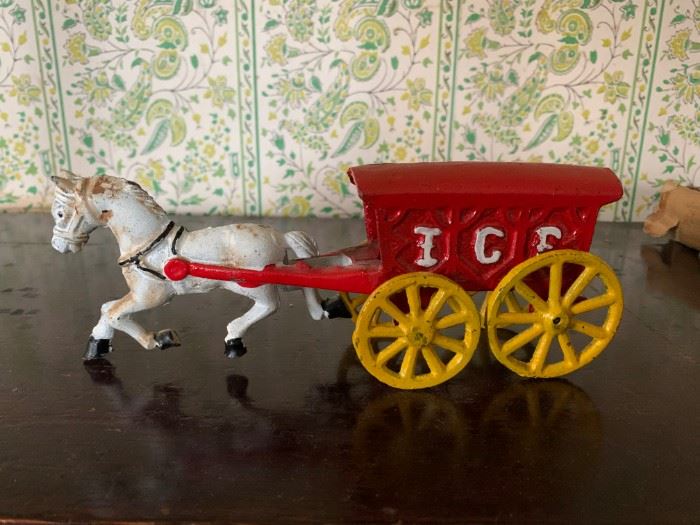 cast iron horse and wagon. 25.00