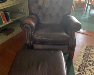 Leather chair and ottoman. 250.00