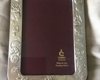 New sterling silver baby frame by Cunill with places for engraving holds 4x6 photo