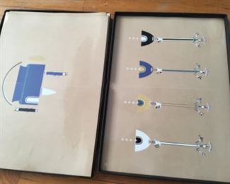 And two more, our price $95.00 for the whole enchilada book in box and all pristine plates SALE $75.00