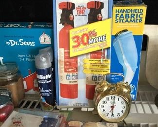 Fire extinguishers new in package $8.00, Mozart CDs new in package $5.00, fabric steamer $5.00