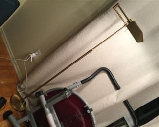 Brass swivel adjustable floor lamp for precise good light, has foot pedal switch, $10.00
