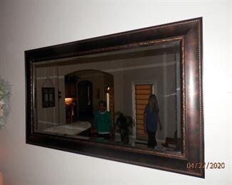 48" x  26" beveled wall mirror....bead work boarder trim. ****$175.00****