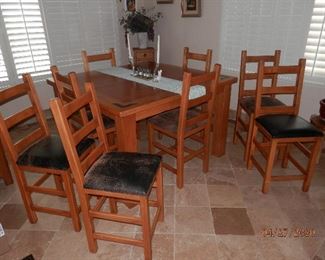  $675.00   9 piece set......Hardwood "Country Pine" Counter Height dining table with 8 matching ladder back "stools"  table 57" x 57".  All nine pieces .... $675.00.... no condition issues (760) 445-8571.........CJ