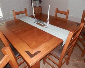 $675.00  9 piece set.......Counter height 57" x 57" country pine table from previous photo  (Table and 8 matching "stools".)