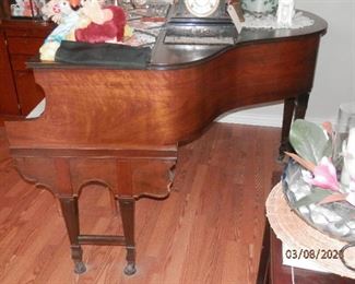 Gorgeous side shot of Walnut Gulbransen Petite Baby grand piano.  Well cared for... plays well....no bad keys....part of family for over 70 years...$3650.00       (760) 445-8571...........CJ
