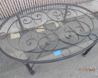 Wrought Iron oval coffee table with glass top....great for outdoor patio or ???  30" x 48".   *** $150.00 ***        (760) 445-8571..............CJ