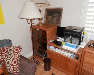 $60.00   This is ONE item....component cabinet with dark glass doors and a T.V. stand / cabinet to its right.  Measurements are 24" w X  39"h for glass door portion and 29"w x 35"h on the TV portion...Condition is excellent  ****$65****  DJ  (760) 975-5483.  TWO nice lamps...$45 floor lamp and $40 on table lamp.  Both excellent with excellent shades.