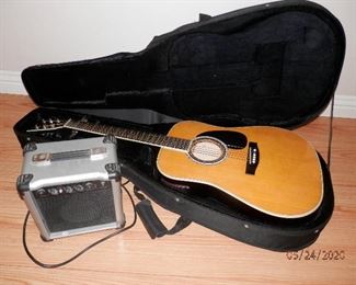 Esteban acoustic / electric guitar package , includes case and  C-10 amplifier.  $100.00